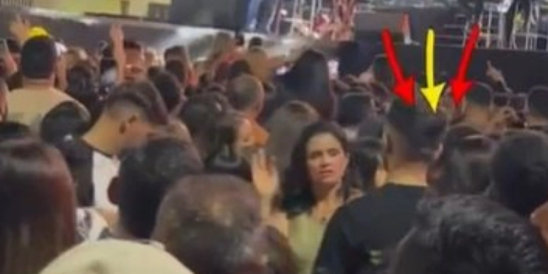 Mãe emociona ao ser flagrada traduzindo show em libras para o filho com deficiência auditiva em Santana dos Garrotes
